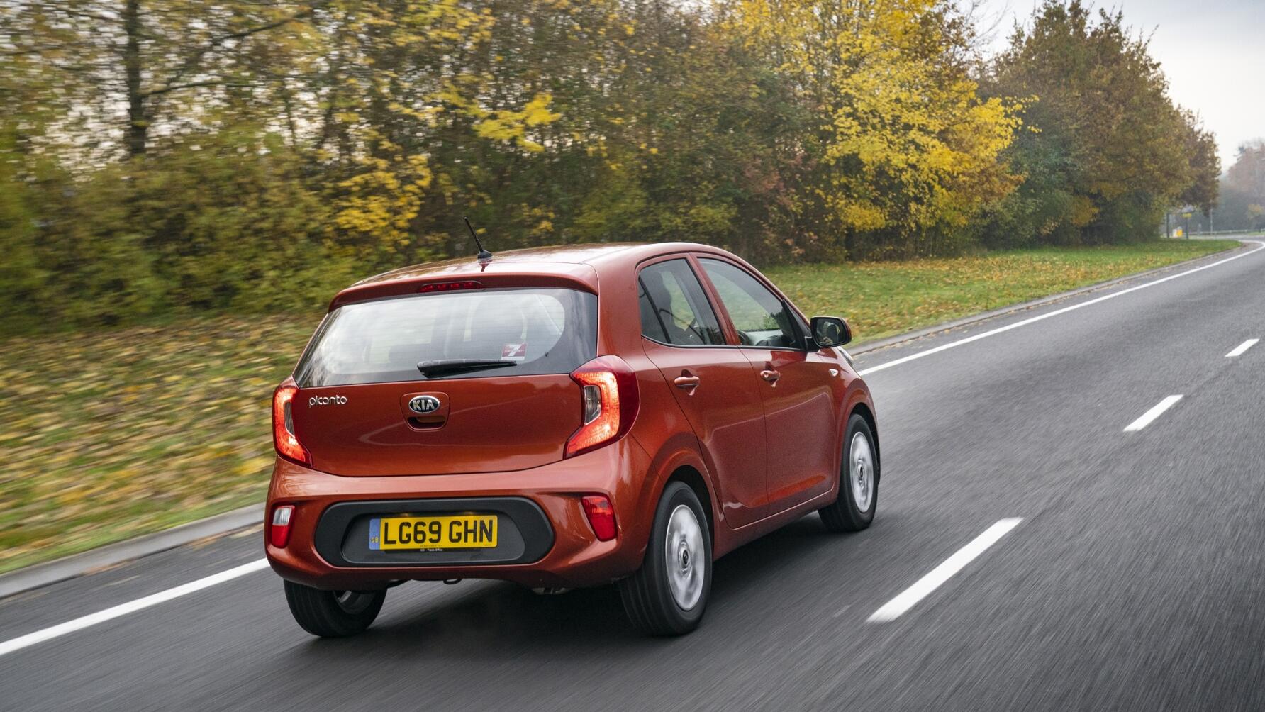 Driving shot of Kia Picanto from the rear driver side, on country road